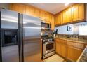 Efficient kitchen featuring stainless steel appliances, light wood cabinetry, and durable countertops at 2232 Dunseath Ave # 407, Atlanta, GA 30318