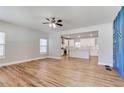 Spacious living room boasts new hardwood floors, recessed lighting and neutral color palette at 870 Gaston Sw St, Atlanta, GA 30310