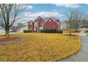 Charming red brick home with mature trees and a sprawling front yard in a desirable neighborhood at 4419 Bellwood Cir, Atlanta, GA 30349