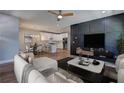 Open-concept living space with modern decor, seamlessly connected to the kitchen and dining area at 158 Hemphill School Rd, Atlanta, GA 30331