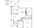 First floor plan featuring an open concept kitchen/dining area, two-story great room, office, and two-car garage at 7043 Foundry Dr, Woodstock, GA 30188