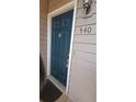 Stylish teal front door with a decorative knocker and clear unit number 340 at 340 Teal Ct, Roswell, GA 30076