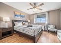 Comfortable bedroom with a queen-sized bed, stylish linens, and a large window offering a scenic view at 215 Piedmont Ne Ave # 2003, Atlanta, GA 30308