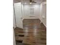 Bedroom with luxury vinyl flooring and a ceiling fan at 2523 Hood Nw Ave, Atlanta, GA 30318