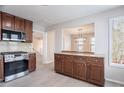 The beautifully updated kitchen offers stainless steel appliances and lovely granite countertops at 4809 Burlington Nw Ct, Acworth, GA 30102