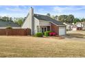 Charming home featuring a combination of vinyl and brick exterior with a well-maintained front yard at 2814 Pine Valley Nw Way, Kennesaw, GA 30152