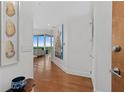 Hallway showcasing artwork and a view of the balcony and the outdoors at 3300 Windy Ridge Se Pkwy # 1501, Atlanta, GA 30339