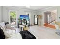 Comfortable living area with stylish furniture and bright lighting from large windows at 4812 Lismoor Sw Trce, Mableton, GA 30126