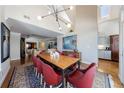 Elegant dining room with high ceilings, modern lighting, and ample space for entertaining guests at 6 Lullwater Ne Est, Atlanta, GA 30307