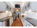 Well-equipped kitchen with granite countertops, stainless steel appliances, and ample cabinet space at 6 Lullwater Ne Est, Atlanta, GA 30307