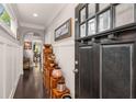 Inviting foyer featuring hardwood floors, elegant wainscoting and decor at 357 Murray Hill Ne Ave, Atlanta, GA 30317