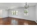 Bright living room with hardwood floors, natural light, and neutral walls at 3501 Wesley Chapel Rd, Decatur, GA 30034