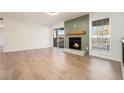 Spacious living room with hardwood floors, fireplace and natural light at 2901 Lenox Ne Rd # 901, Atlanta, GA 30324