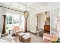 Bright and airy living room with large windows, stylish decor, and ample seating at 1515 Walker Ave, Atlanta, GA 30337