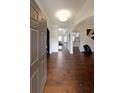 Inviting foyer with gleaming hardwood floors, leading to an open-concept living space at 3725 Rifflewood Way, Douglasville, GA 30135