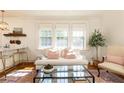 Bright living room with a neutral color palette and plenty of natural light at 824 Greenwood Ne Ave # 9, Atlanta, GA 30306
