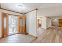 Bright foyer with tile flooring and an open view to the living spaces and front door at 452 Hightower Ridge Rd, Covington, GA 30014