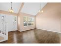 Spacious living room with beautiful hardwood floors, natural light, and a welcoming atmosphere at 6422 Phillips Ct, Lithonia, GA 30058