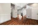 Bright living room with hardwood floors, fireplace, and open layout, perfect for entertaining at 8207 Fairview Blf, Alpharetta, GA 30022