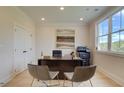 Bright home office with large window, modern desk, and ample workspace at 2740 Byess Ct, Marietta, GA 30064