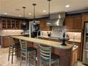Spacious kitchen with a large island, custom cabinets, and stainless steel appliances at 2112 Fisher Ne Trl, Atlanta, GA 30345