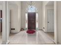 Spacious foyer with marble flooring, chandelier, and natural light creates an elegant entrance at , Stone Mountain, GA 30088