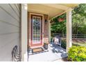 Inviting front porch with decorative accents, stone details, and a welcoming atmosphere at 2436 Sardis Chase Ct, Buford, GA 30519