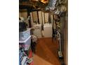 Unfinished basement with washer, dryer and exposed ductwork and pipes at 3346 Northcrest Rd # A, Atlanta, GA 30340