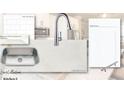 Kitchen sink with a stainless steel faucet and linen-collection tiles at 2832 Evanshire Ave # 112, Duluth, GA 30096