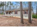 A well-maintained ranch-style home with a classic design in a natural setting at 5700 Tracy Dr, Mableton, GA 30126