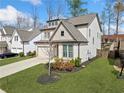 Lovely home with a well-kept lawn, attractive landscaping, and a welcoming front exterior at 234 Fieldbrook Xing, Canton, GA 30115