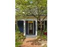 Inviting home exterior with a brick walkway leading to a classic front door with house number displayed above at 427 Cherokee Se Ave, Atlanta, GA 30312