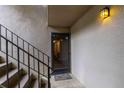 View of a condo entrance, showcasing a welcome mat and entry door at 177 Nw Amherst Pl, Atlanta, GA 30327
