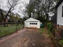 View of detached garage with a white exterior, providing ample storage and parking space at 2665 Northview Ave, Decatur, GA 30032
