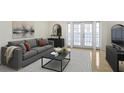 Contemporary living room with a gray sofa, a black coffee table, and French doors leading to a balcony at 1445 Monroe Ne Dr # C6, Atlanta, GA 30324