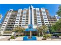Beautiful high rise condo building with lovely landscaping and sleek architectural design at 1130 Piedmont Ne Ave # 1407, Atlanta, GA 30309