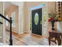 Elegant entryway with wood floors and decorative front door, offering a warm welcome at 3130 Crestmont Nw Way, Kennesaw, GA 30152
