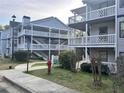 Complex exterior shows multiple buildings with patios and assigned parking at 3518 Shepherds Path, Decatur, GA 30034