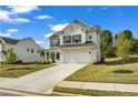 Well maintained two-story home with attached two car garage, nice landscaping and manicured lawn at 5140 Woodline View Cir, Auburn, GA 30011