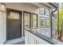 Inviting front entrance with a modern door and decorative windows at 330 Spring Lake Ter, Roswell, GA 30076