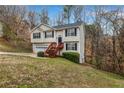 Charming split-level home with a well-maintained front yard and attached garage at 510 Ashland Manor Dr, Lawrenceville, GA 30045