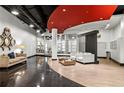 Modern lobby with seating area, mailboxes, and unique architectural details at 115 W Peachtree Nw Pl # 304, Atlanta, GA 30313