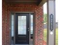 Close up of a home's address number next to a dark colored front door at 4265 Almanor Cir, Norcross, GA 30071