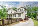 Side view of home with a private driveway and walkway at 354 Greenwood Ave, Decatur, GA 30030