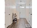 Bright entryway with hardwood floors and natural light offers ample storage at 3983 Fireoak Dr, Decatur, GA 30032