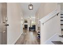 Inviting entryway with hardwood floors leads to a cozy living space with fireplace at 3983 Fireoak Dr, Decatur, GA 30032