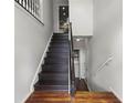 Inviting entryway with hardwood floors and a staircase leading to the upper level at 3450 N Cook Rd, Powder Springs, GA 30127