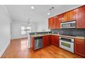 Well-equipped kitchen with granite countertops, stainless steel appliances, and a breakfast bar at 2116 Gorman Se Grv, Atlanta, GA 30316