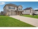 Charming two-story home with a two-car garage and well-manicured lawn at 89 Cowpen Ct, Covington, GA 30014