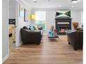 Cozy living room with a fireplace and modern decor at 4307 Orchard Park Ct # A, Stone Mountain, GA 30083